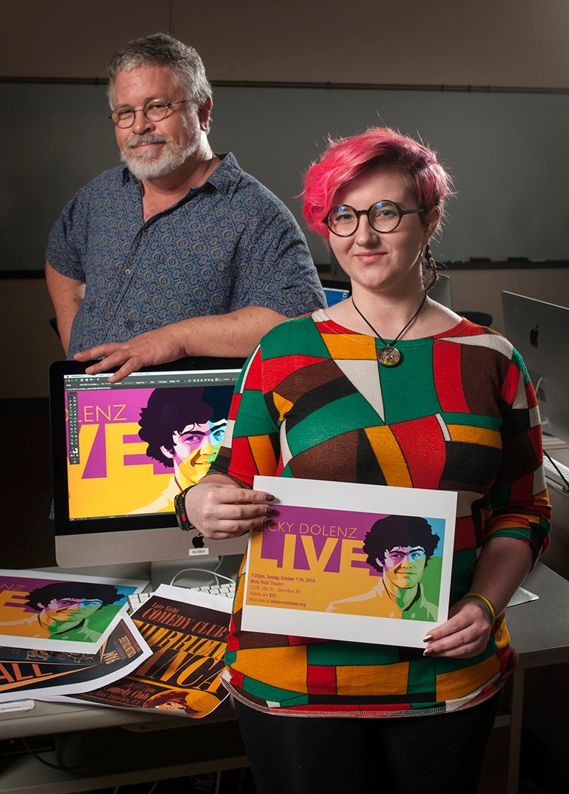 associate professor Kevin Kreneck and student Cari Croninger with her winning artwork